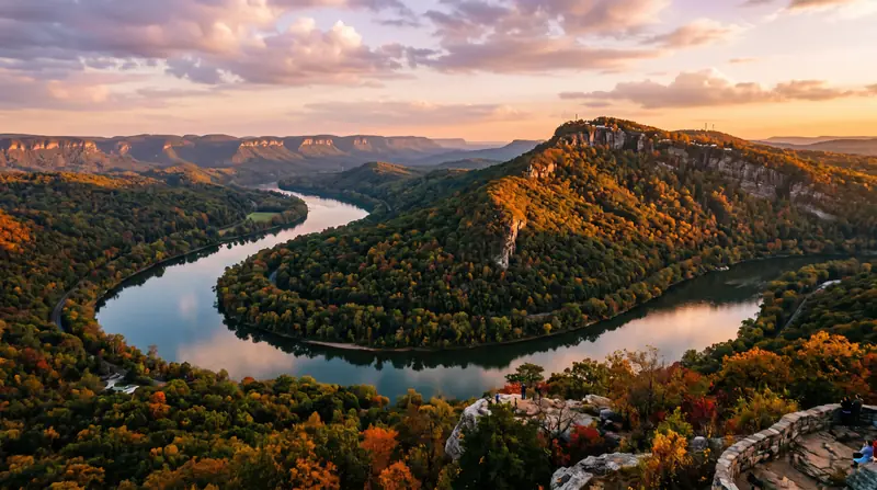 The Tennessee River winding through a forested gorge below Lookout Mountain at golden hour