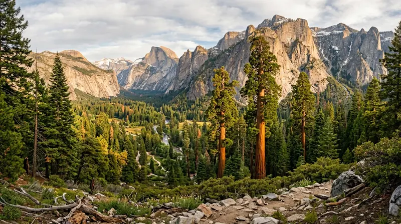 Kings Canyon alpine valley vista with massive granite cliffs and towering giant sequoia trees